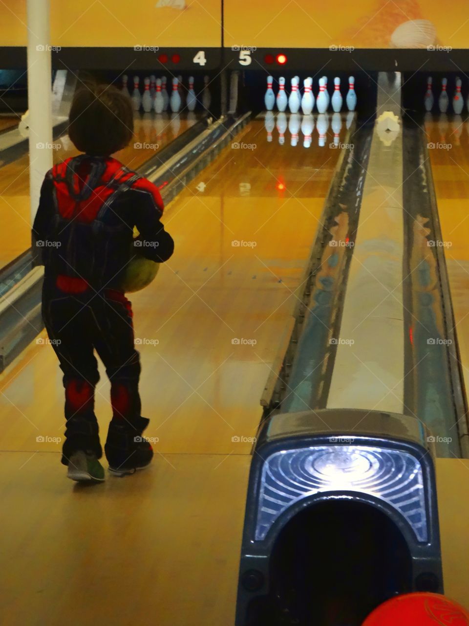 Boy In Bowling Alley