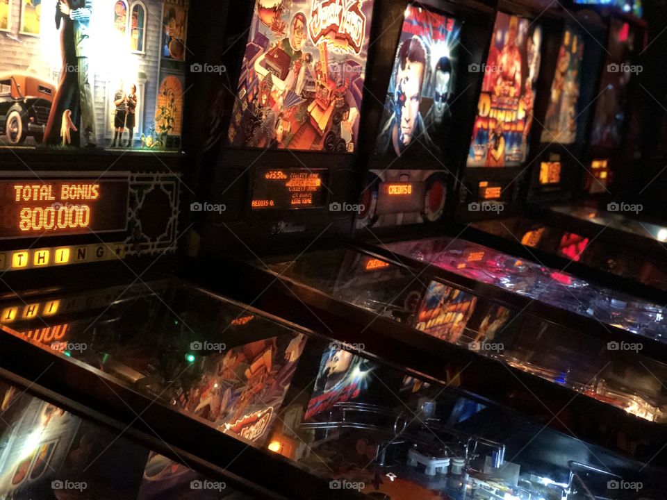 A set up of pinball machines in a Detroit vintage arcade 