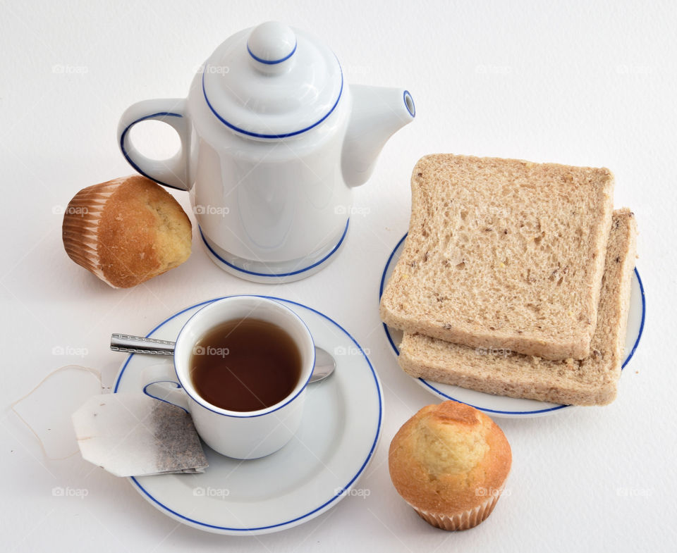 tea, bread and muffins