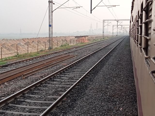this picture shows the beauty of the railway track in India