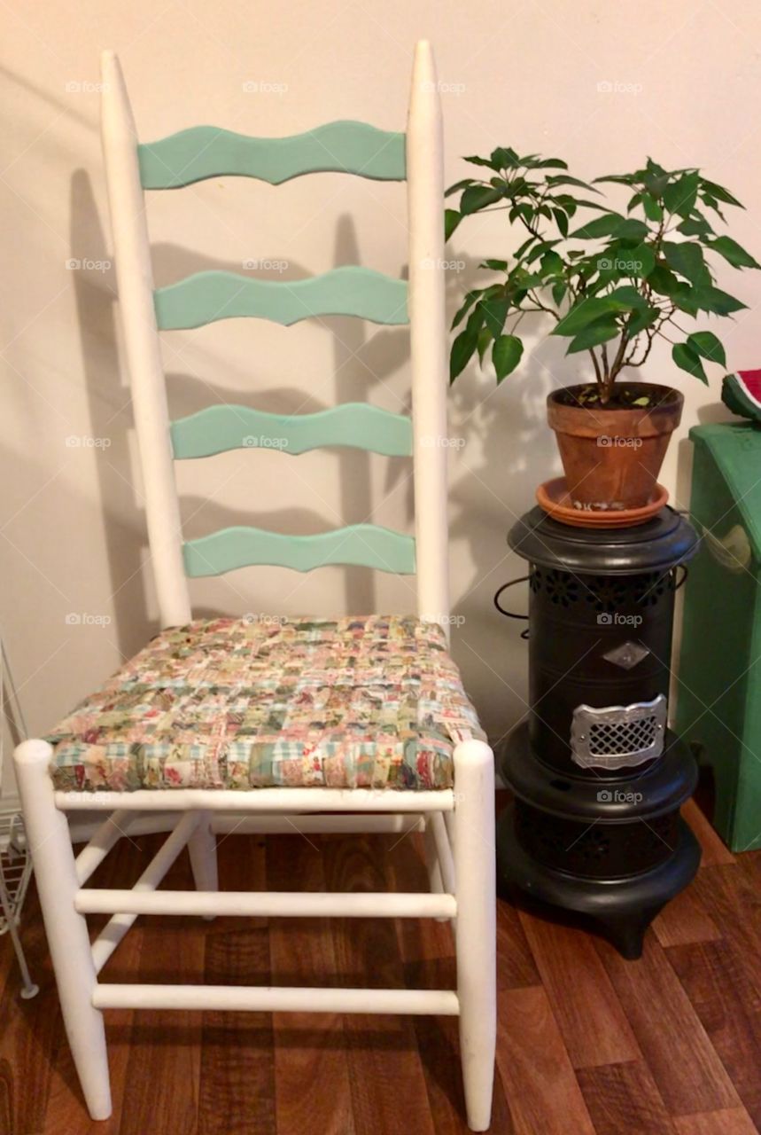Repurposed chair and vintage heater
