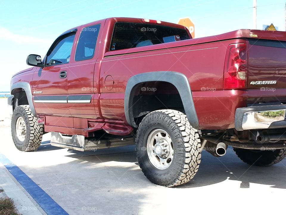 My Wheelchair accessible 2003 Chevrolet Silverado 2500HD with a 6.0L gas engine pushing 150,000 miles, rolling on Goodyear Wrangler Duratrac tires with a dual stainless steel MBRP Performance Exhaust system.