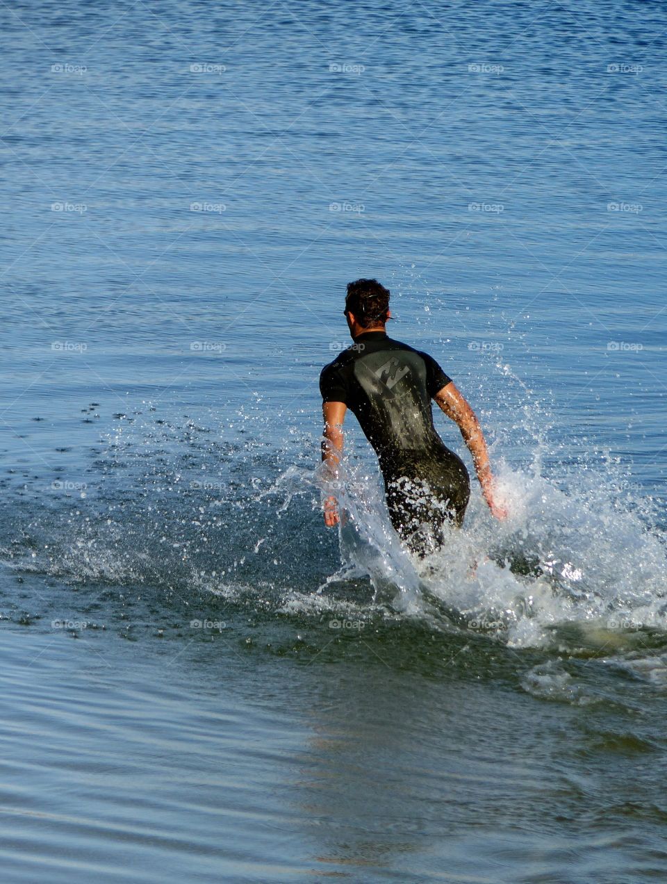 Athlete going for swim 