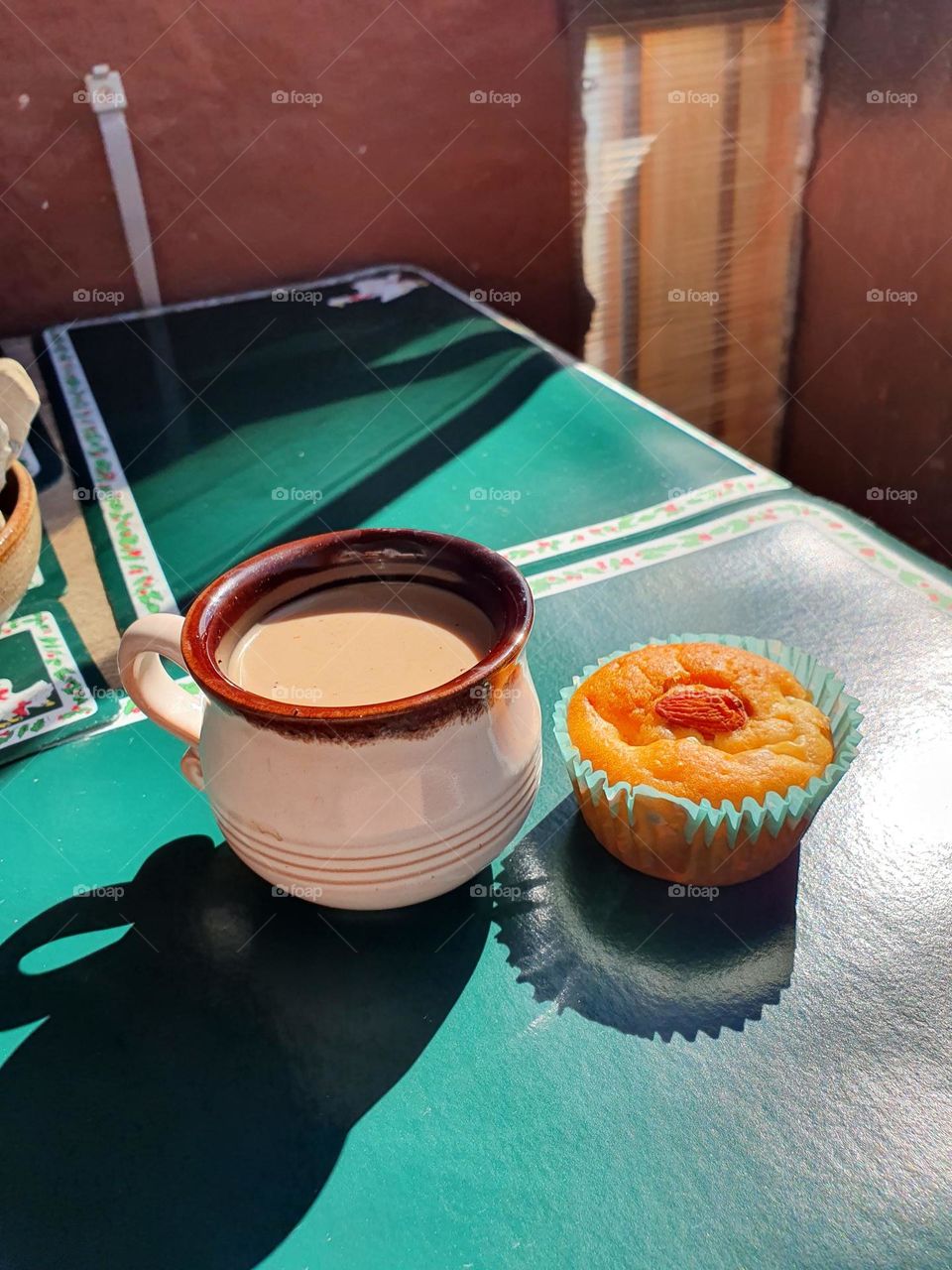 Perfect dessert time with a cup of coffee and homemade muffin.