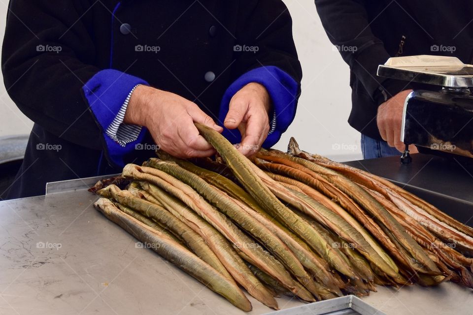 Close-up working hands of a fisherman