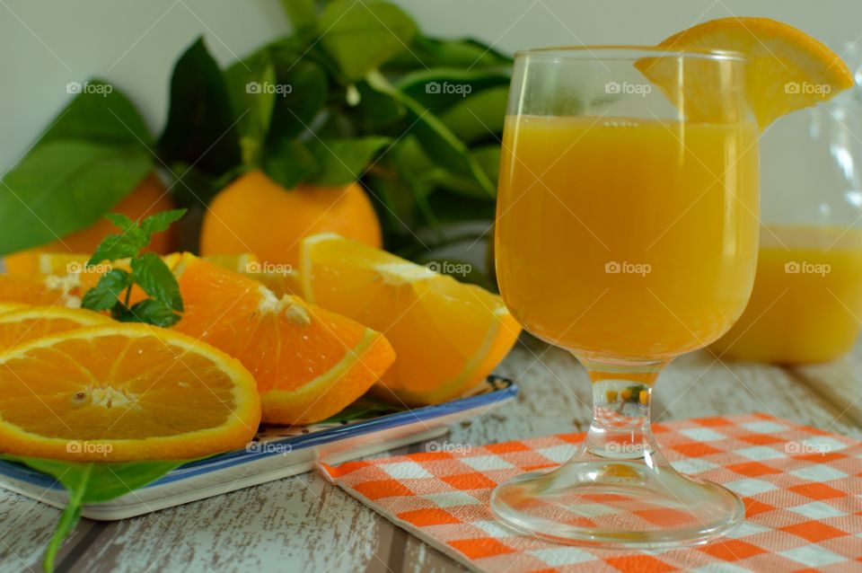 A glass of homemade orange juice