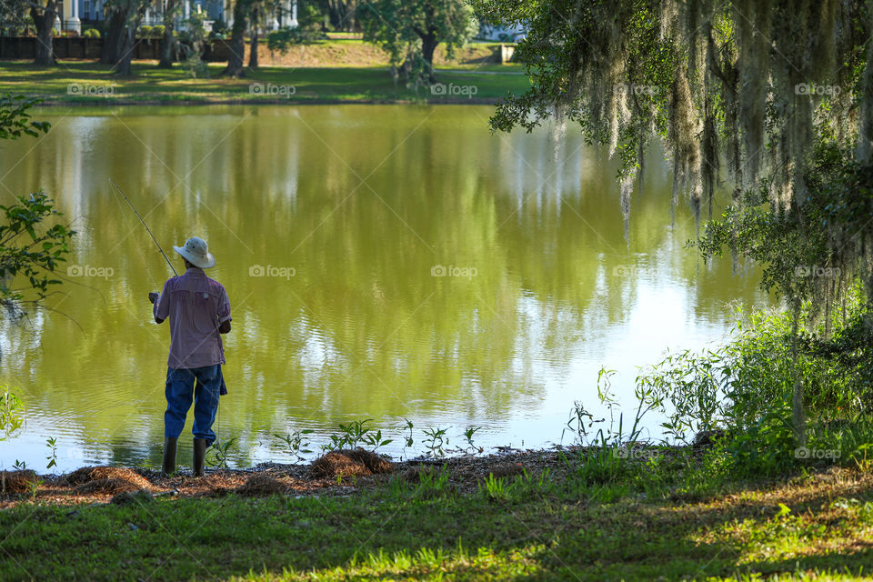 Fishing at fresh water pond in Florida