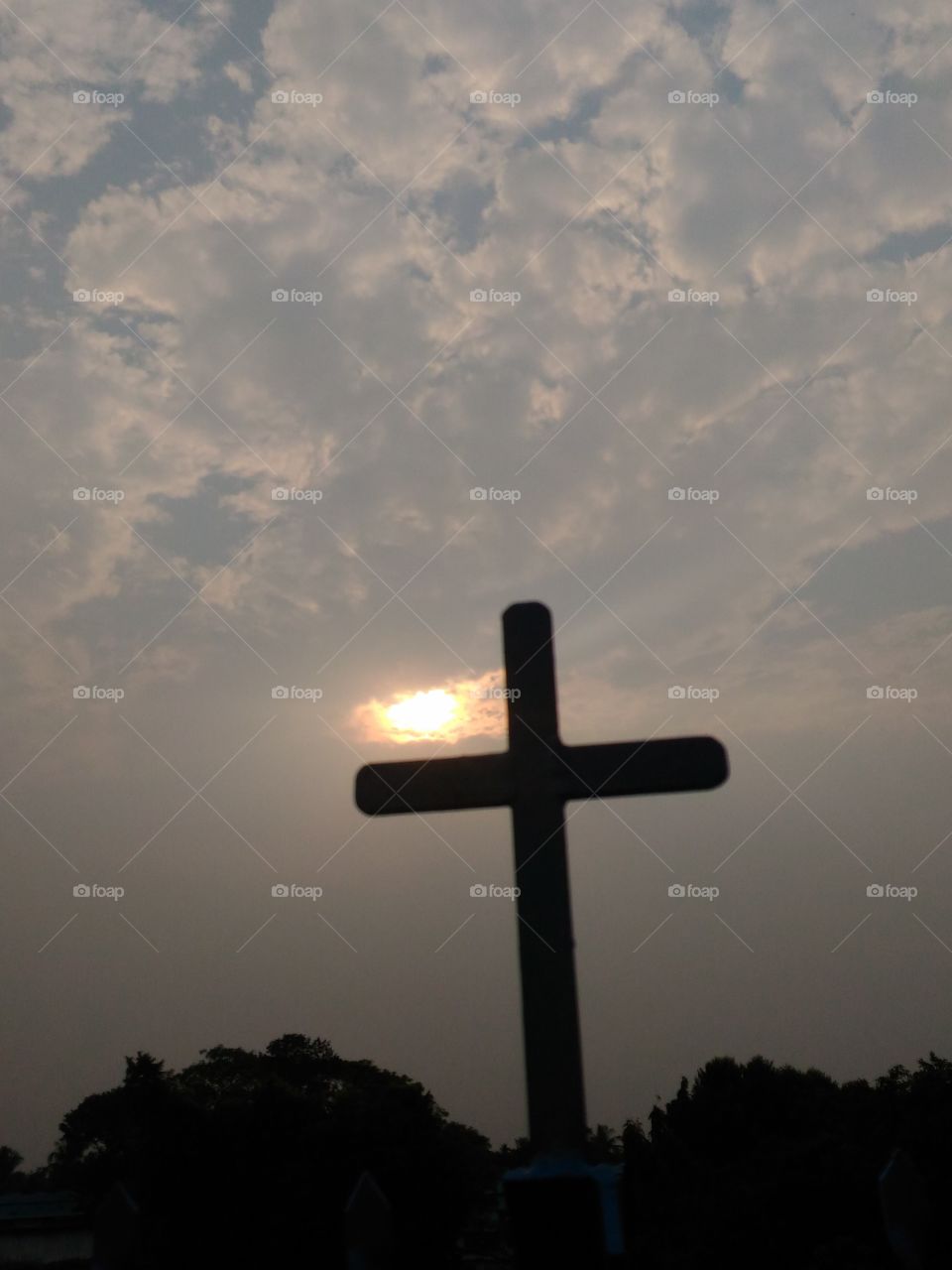jesus is in there behind the cross..