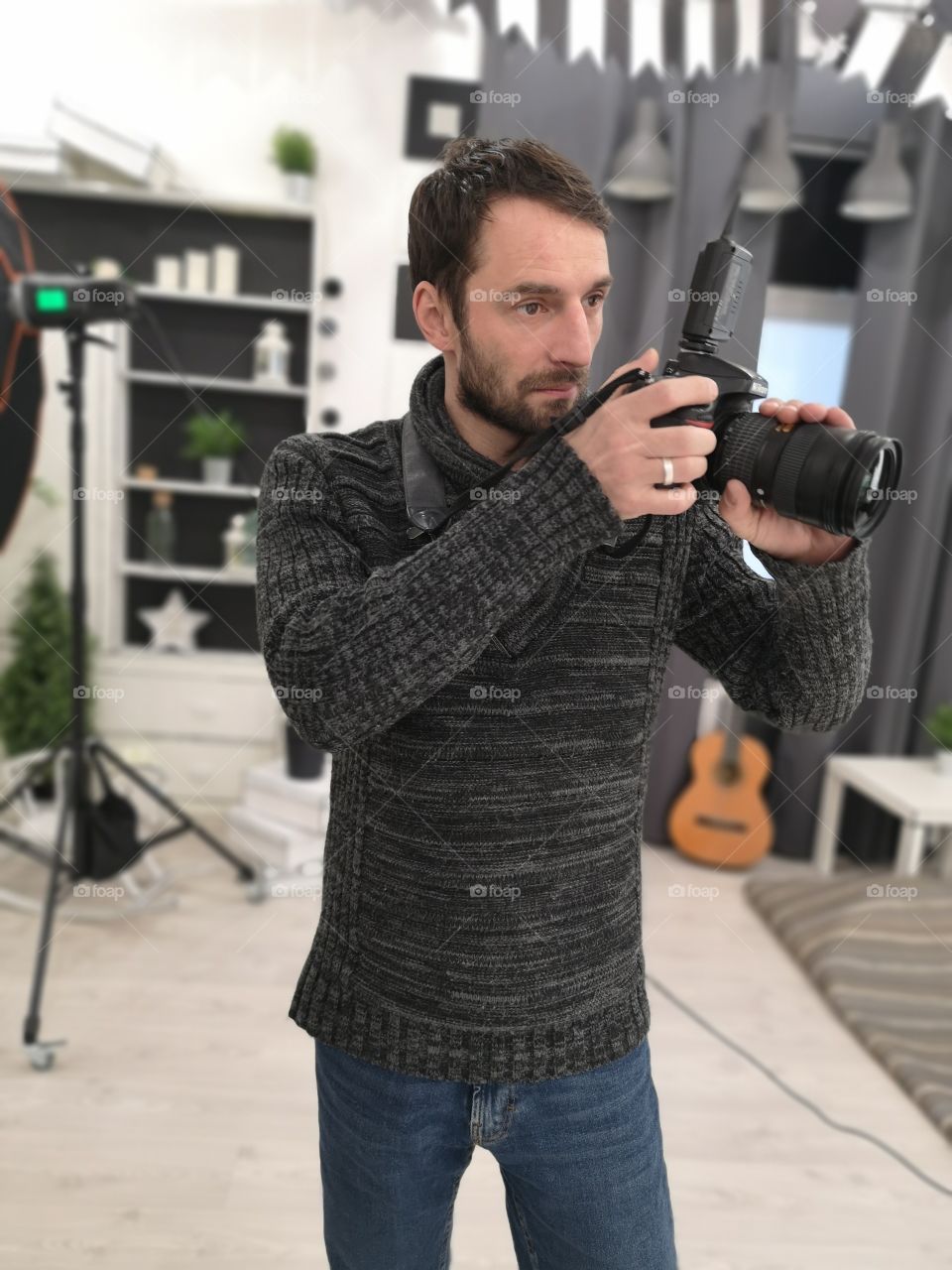 Photographer in studio, nikon