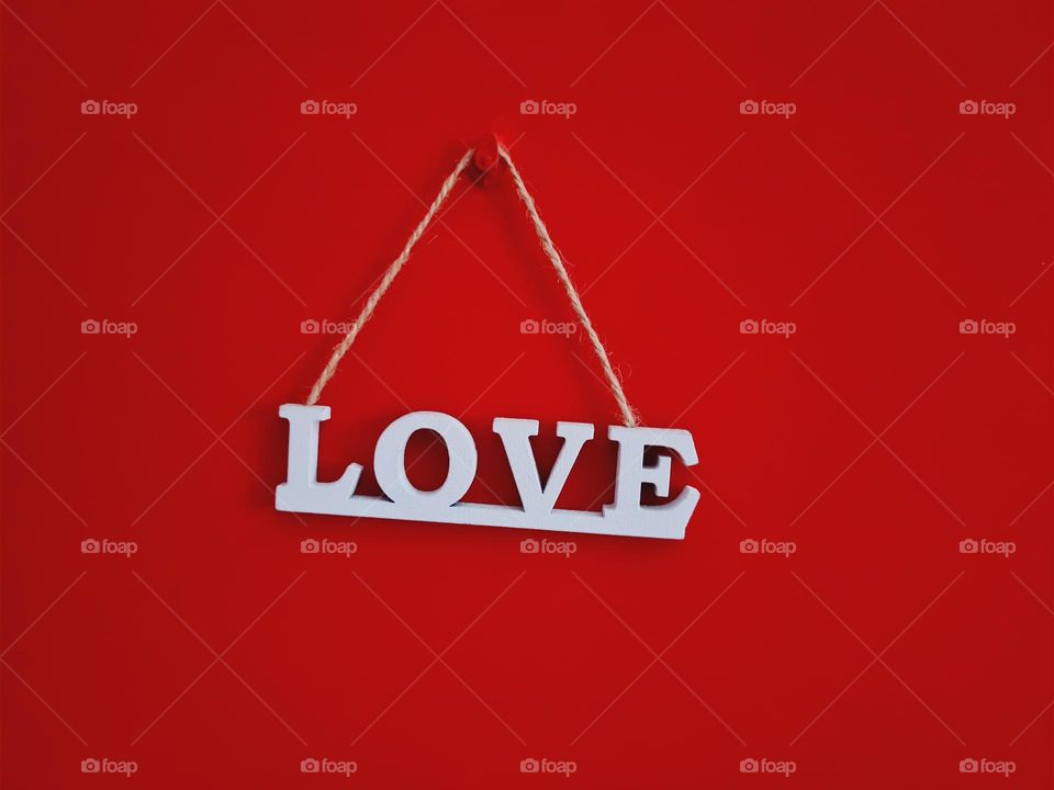 love lettering on red background