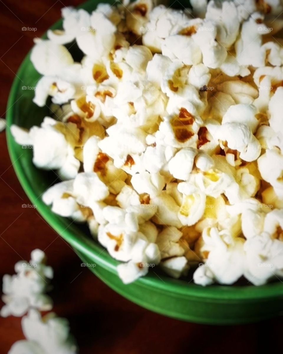 Popcorn in a Green Bowl Up Close