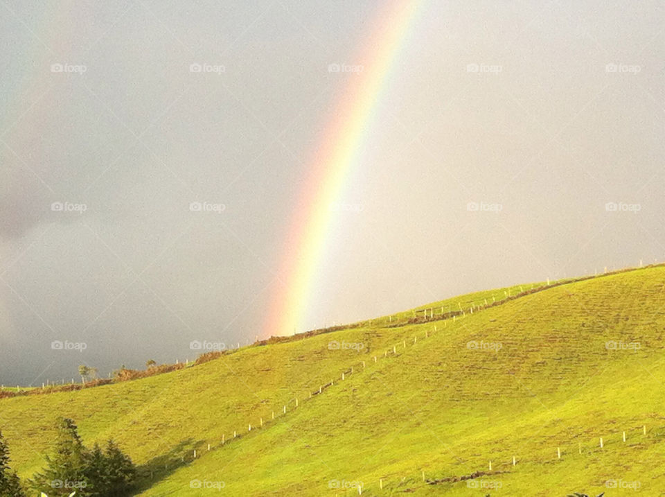 rainbow green mountain rainy sunny day marinilla antioquia colombia by alejin05