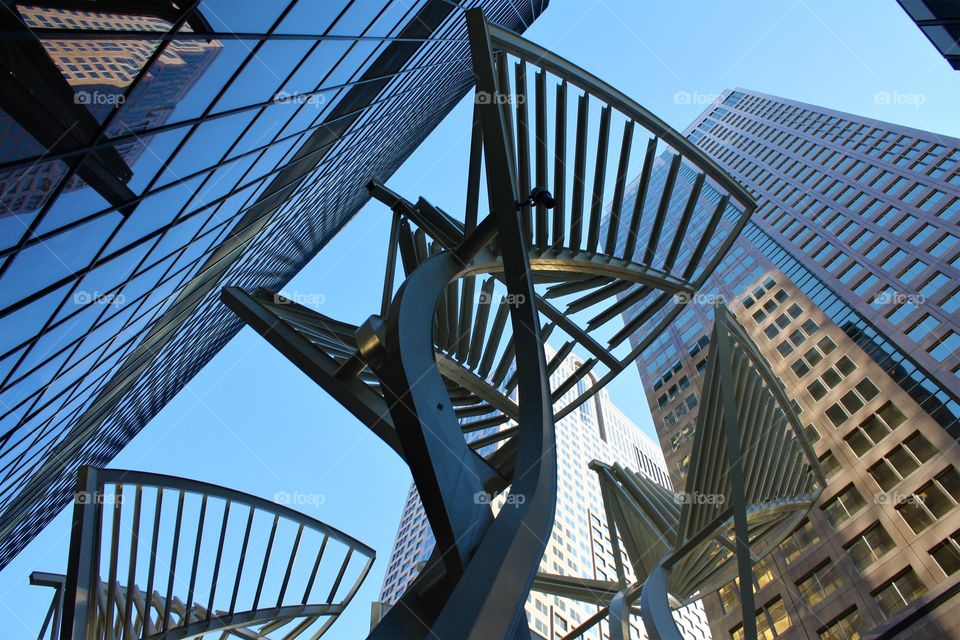 Architectural structures rising up downtown yyc
