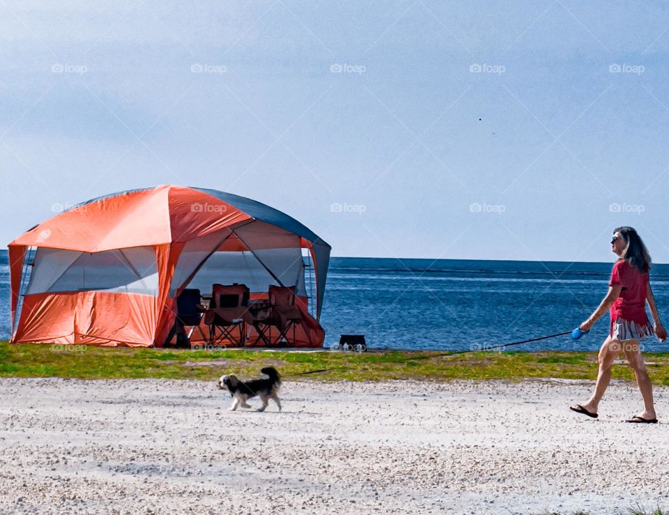 GIRL WALKING HER DOG