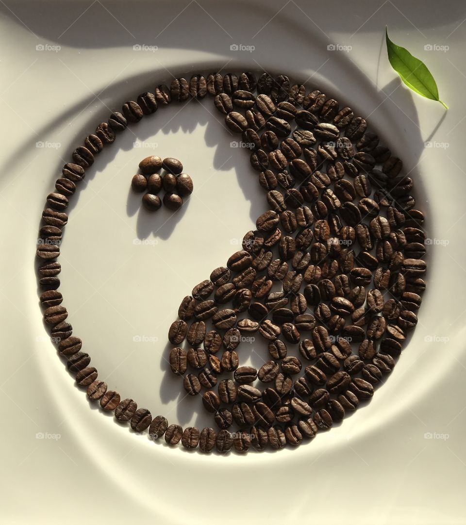 yin-yang in the form of coffee beans