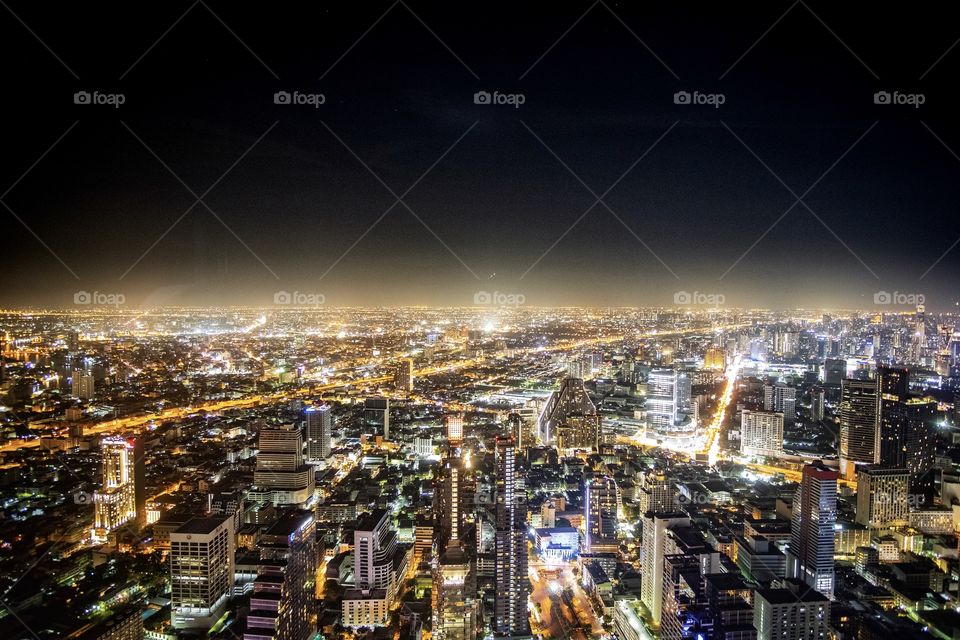 Bangkok/Thailand-May 04 2019:Capital city scape show beautiful night light , photo from roof top of Mahanakorn building