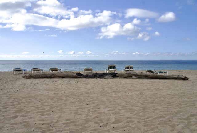 Inviting beach chairs lined up on Lo De Marcos beach.