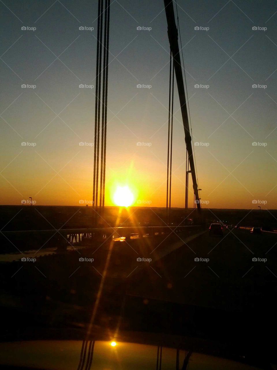 sunset over Delaware bridge