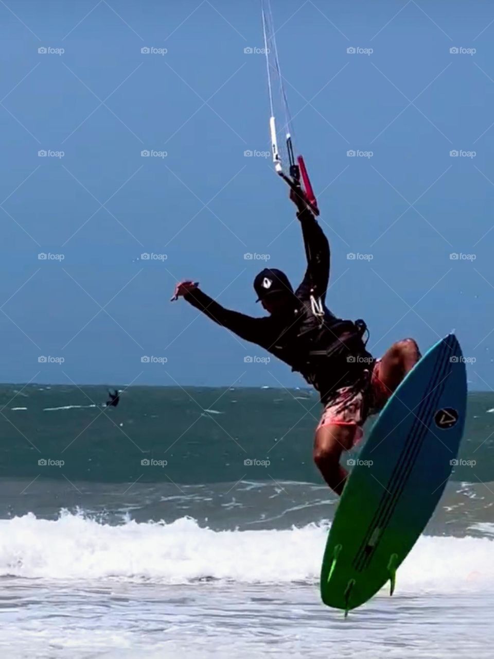 Man practicing kitesurfing