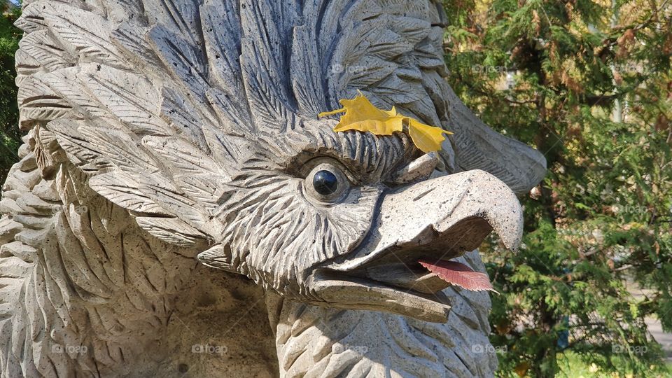 eagle statue in the park in fall