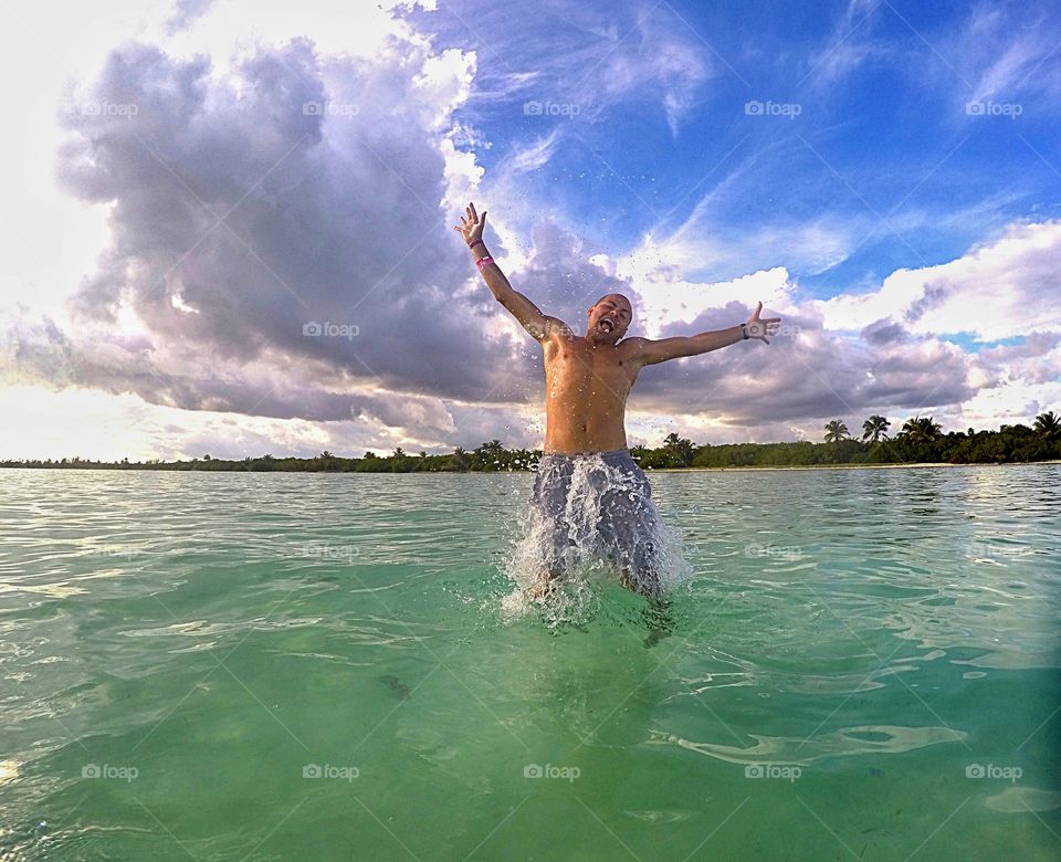 jumping in  the caribbean sea