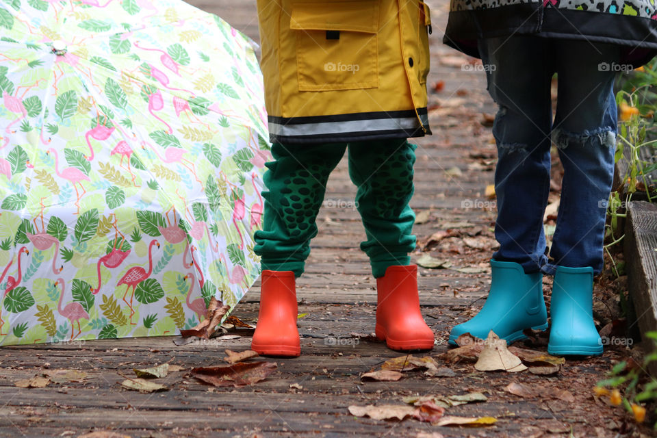 children showing off their boots