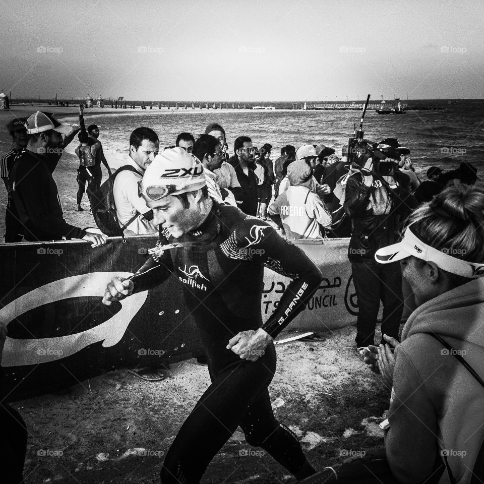 Triathlete. Coming out of the water