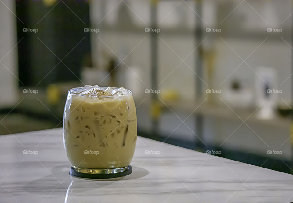 Iced coffee on the  table in the shop.