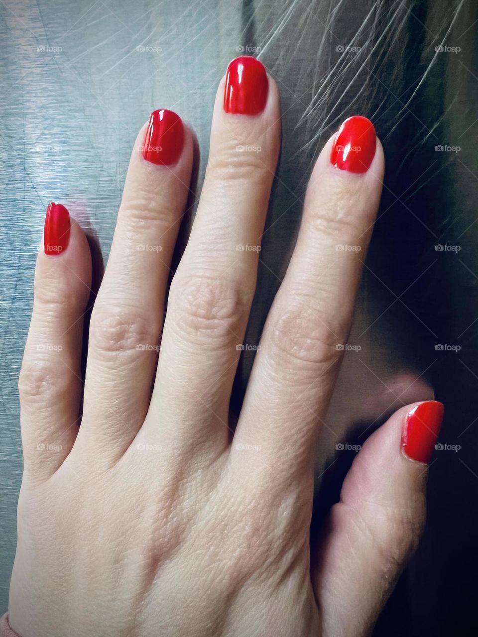 Bright bold red nail polish 