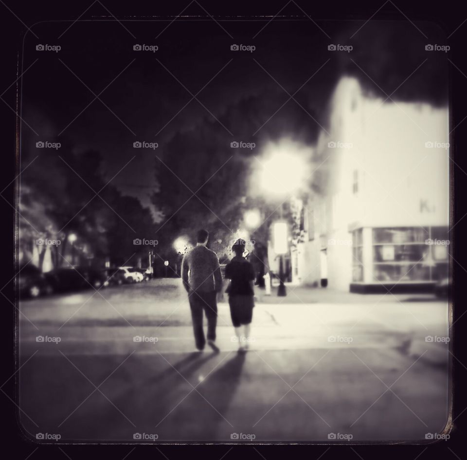 Couple. Holding hands is a promise that for that moment you don't have to face the world alone.