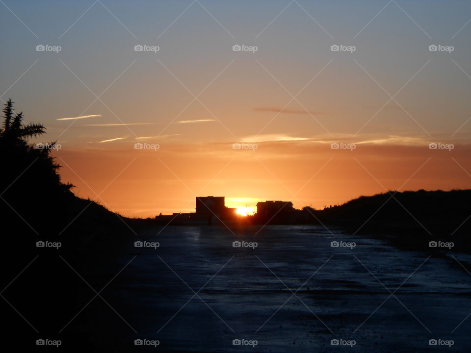 A winter sunrise over a road in Norfolk, UK