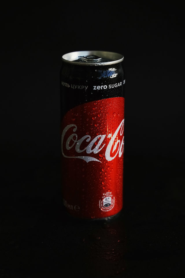 Coca Cola Can On Black Surface
