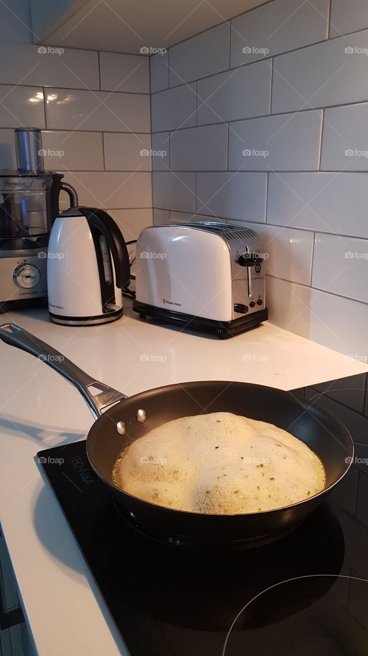 Cooktop Frying Omelette