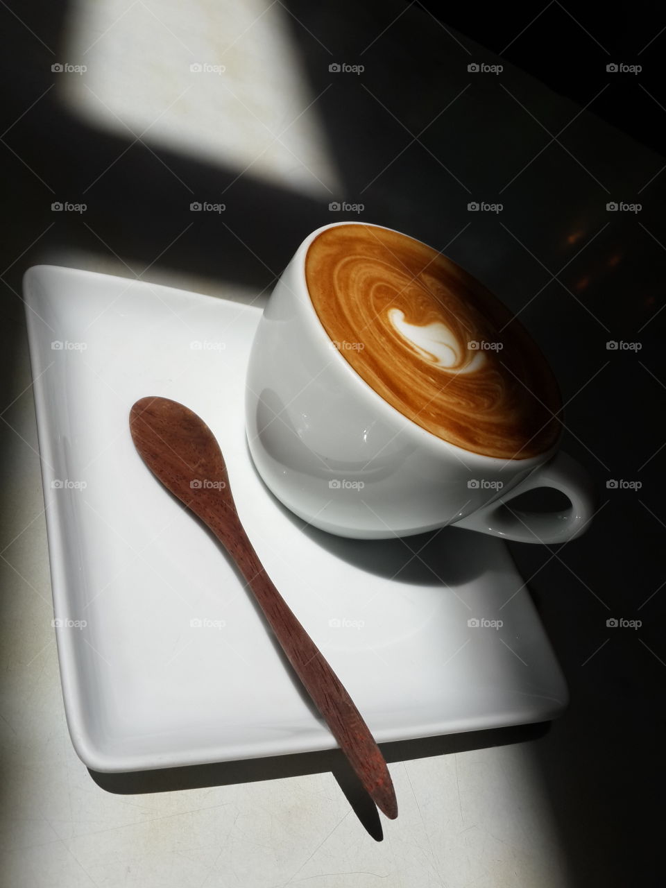 coffee latte in the shadow. art