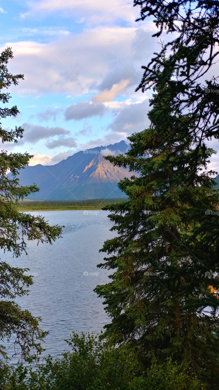 Majestic and serene, this mountain lake lies deep in the wilderness of Alaska.
