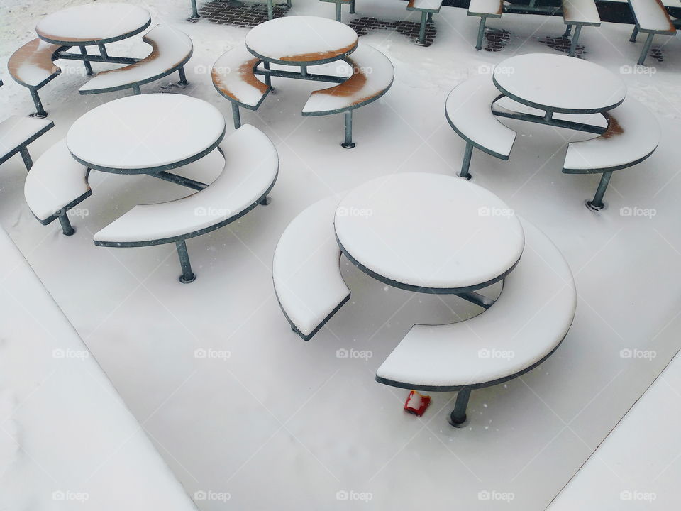 McDonalds tables in the snow in the city of Kiev