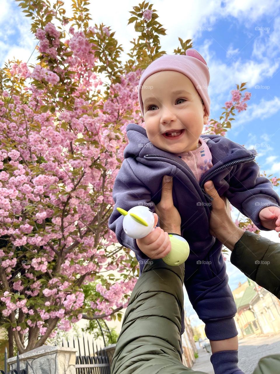 Beautiful cute baby girl with toy