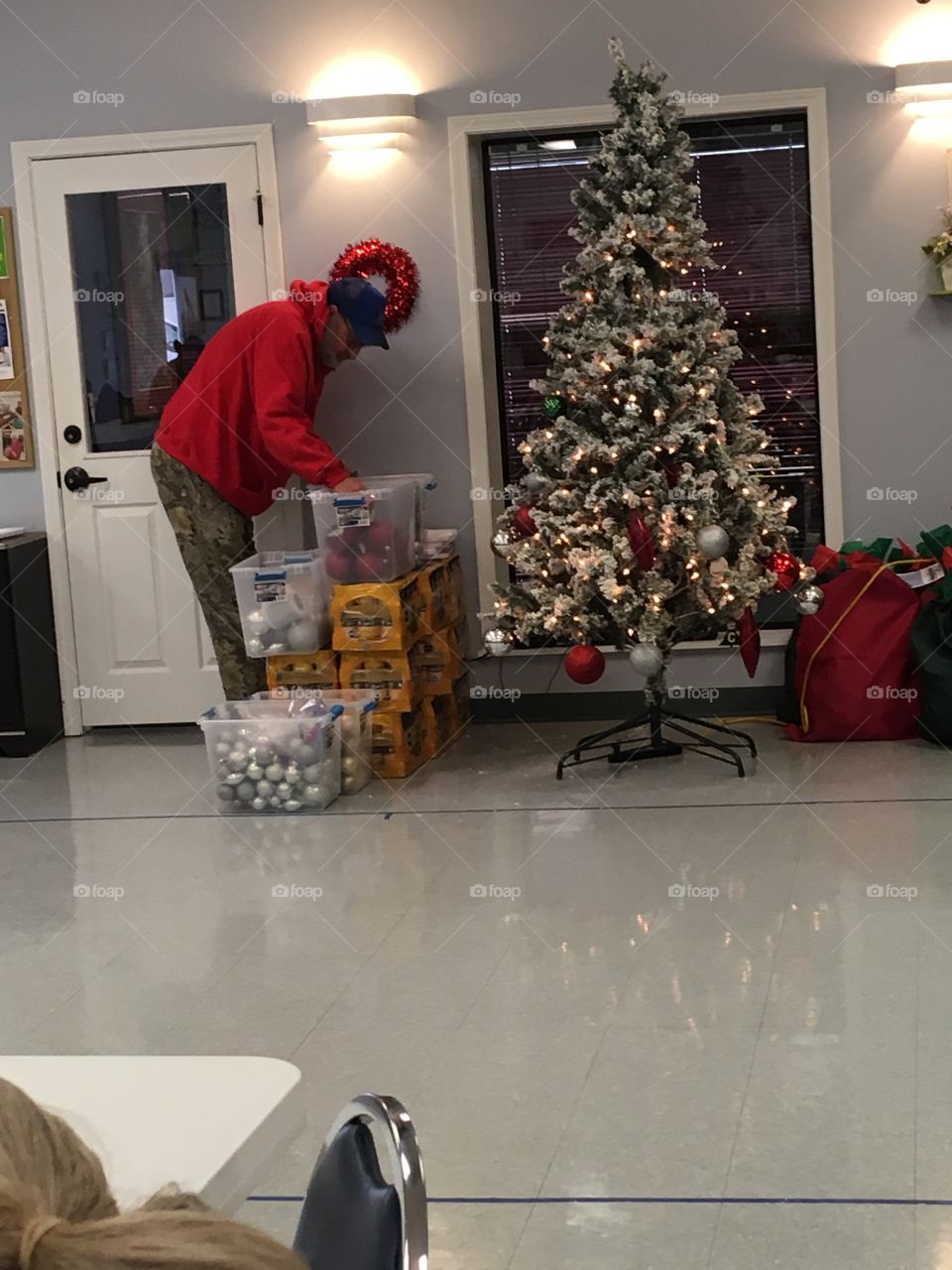 Decorating the Christmas tree at the senior center!