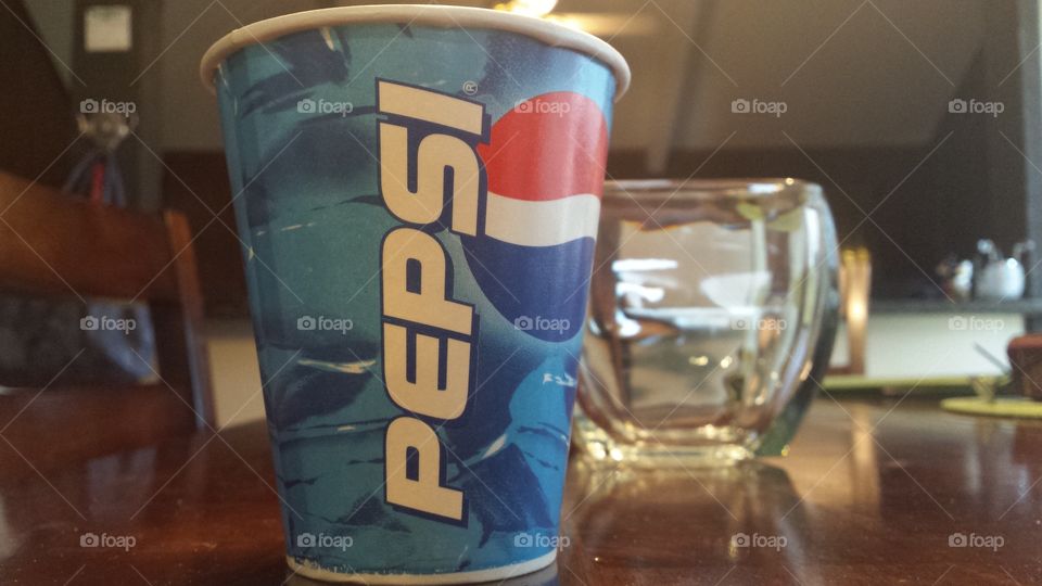 pepsi on the kitchen table