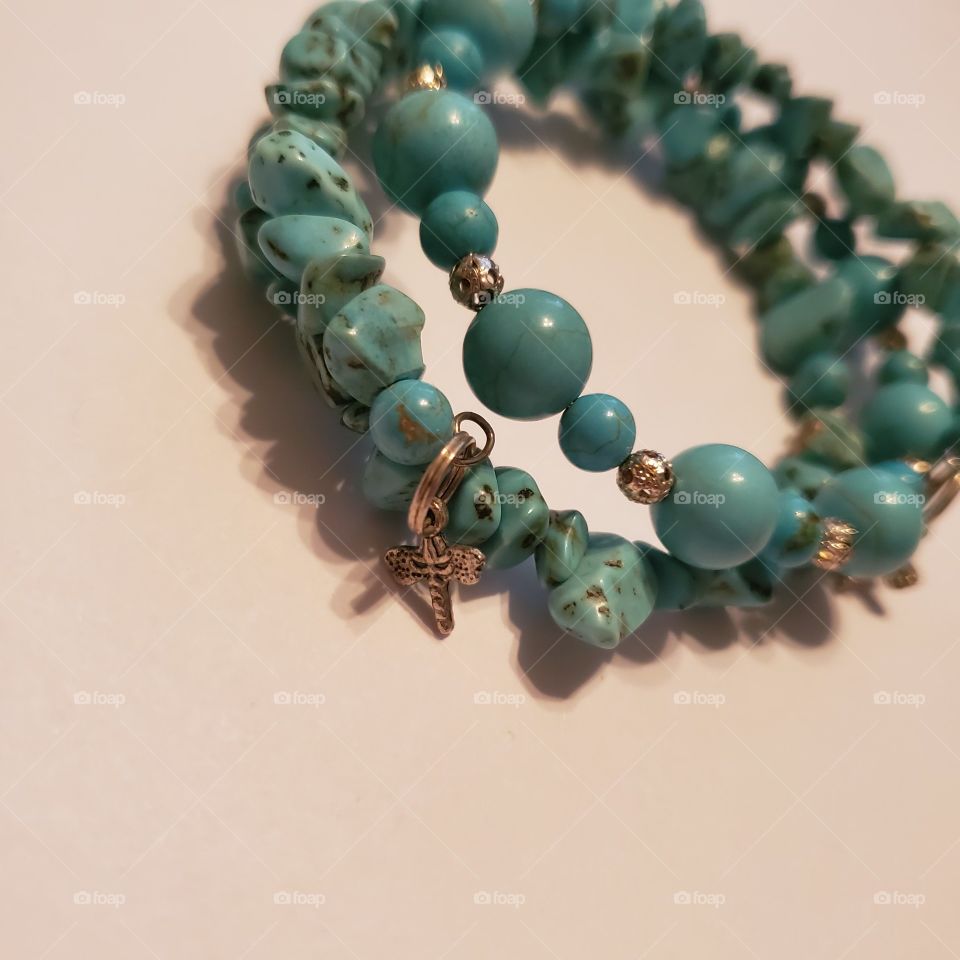 turquoise dragonflies