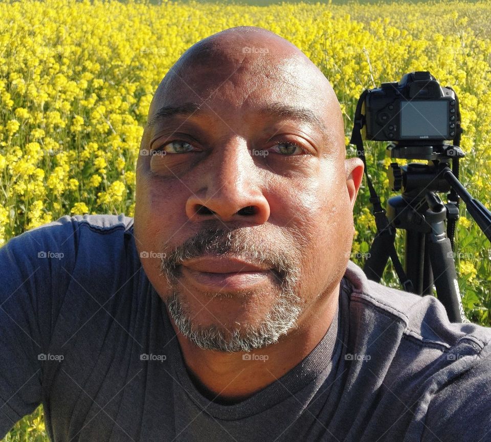 selfie pic in a field of yellow wildflowers
