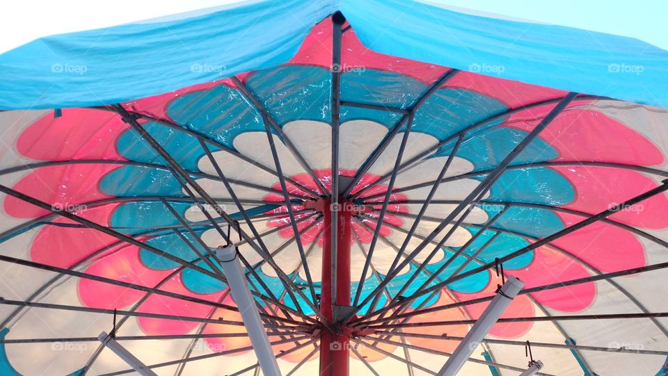 Outdoor patio umbrella with colorful pattern