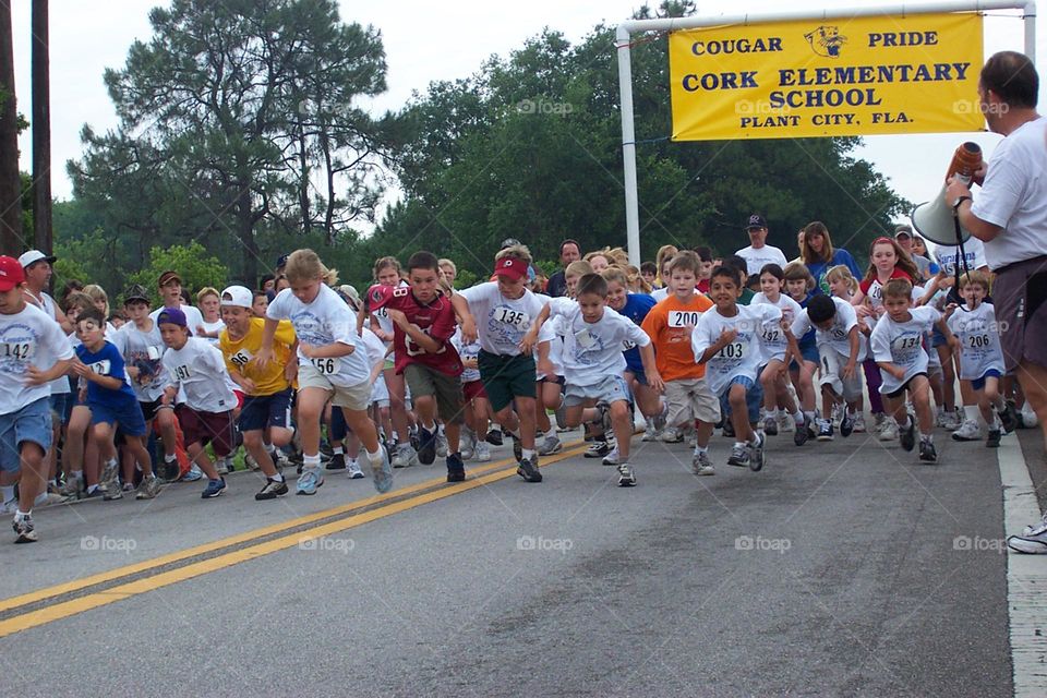 Field day race cork Elementary school children Plant City Florida USA front line off the starting point