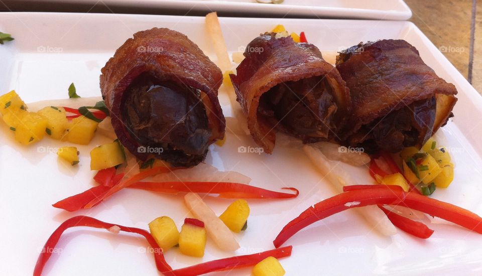 Bacon wrapped sins. Bacon wrapped blue cheese filled dates