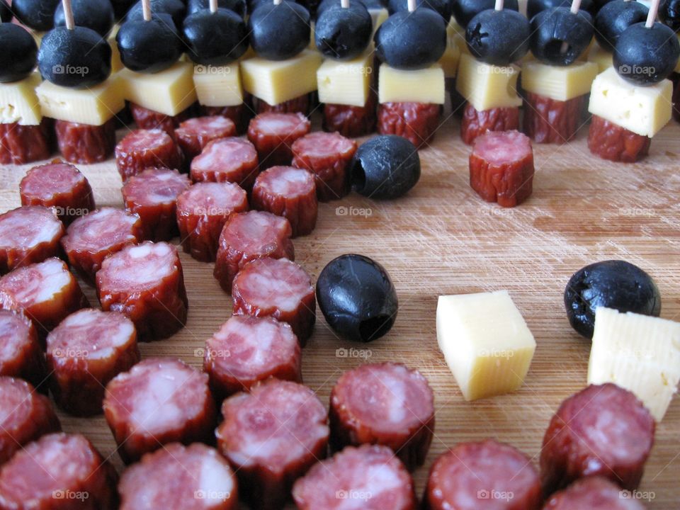 Dry smoked pork sausage, olives and cheese