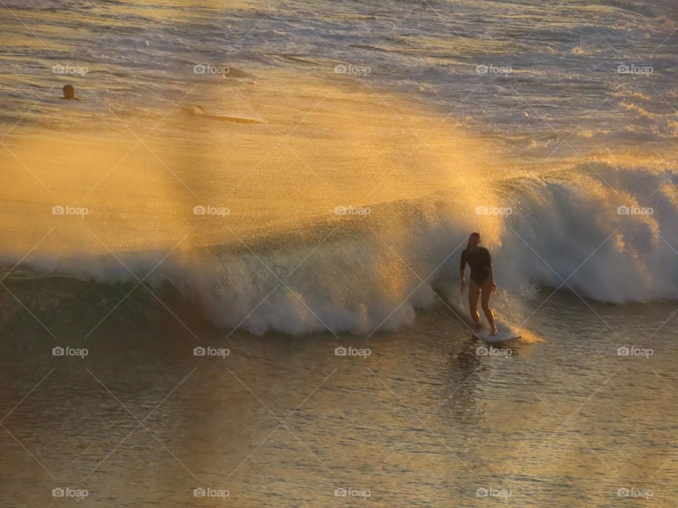 Sunset surfing