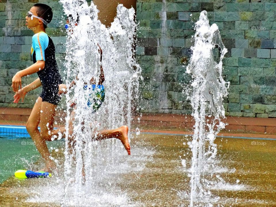 Kids playing with water