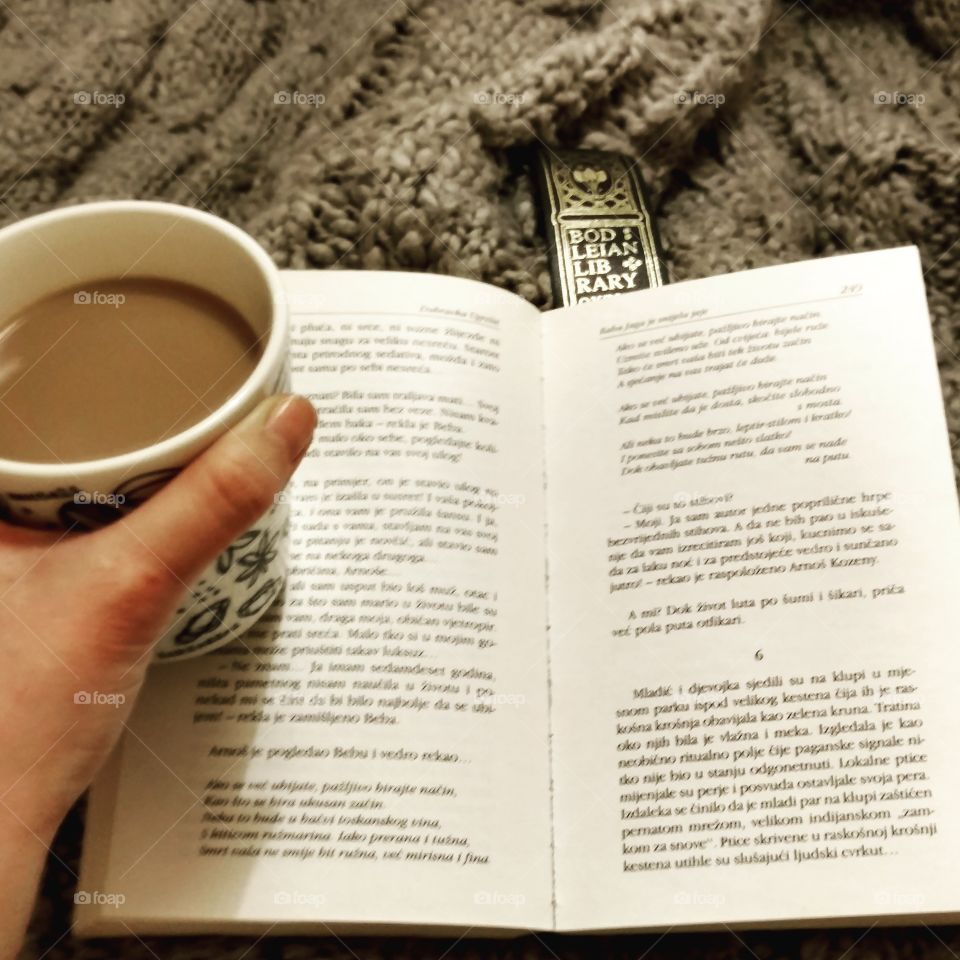 lazy morning under the blanket with coffee and a book.