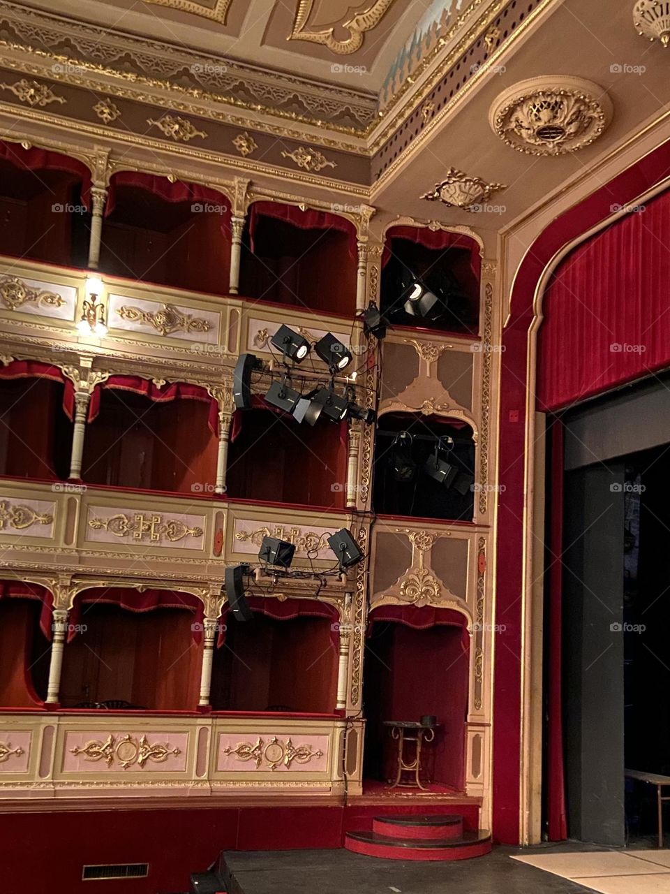 The magic and enchantment of a theater with red curtains.