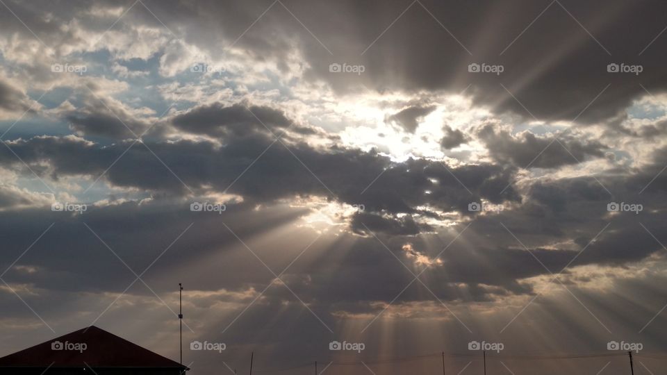 Sun Bursting Through Clouds